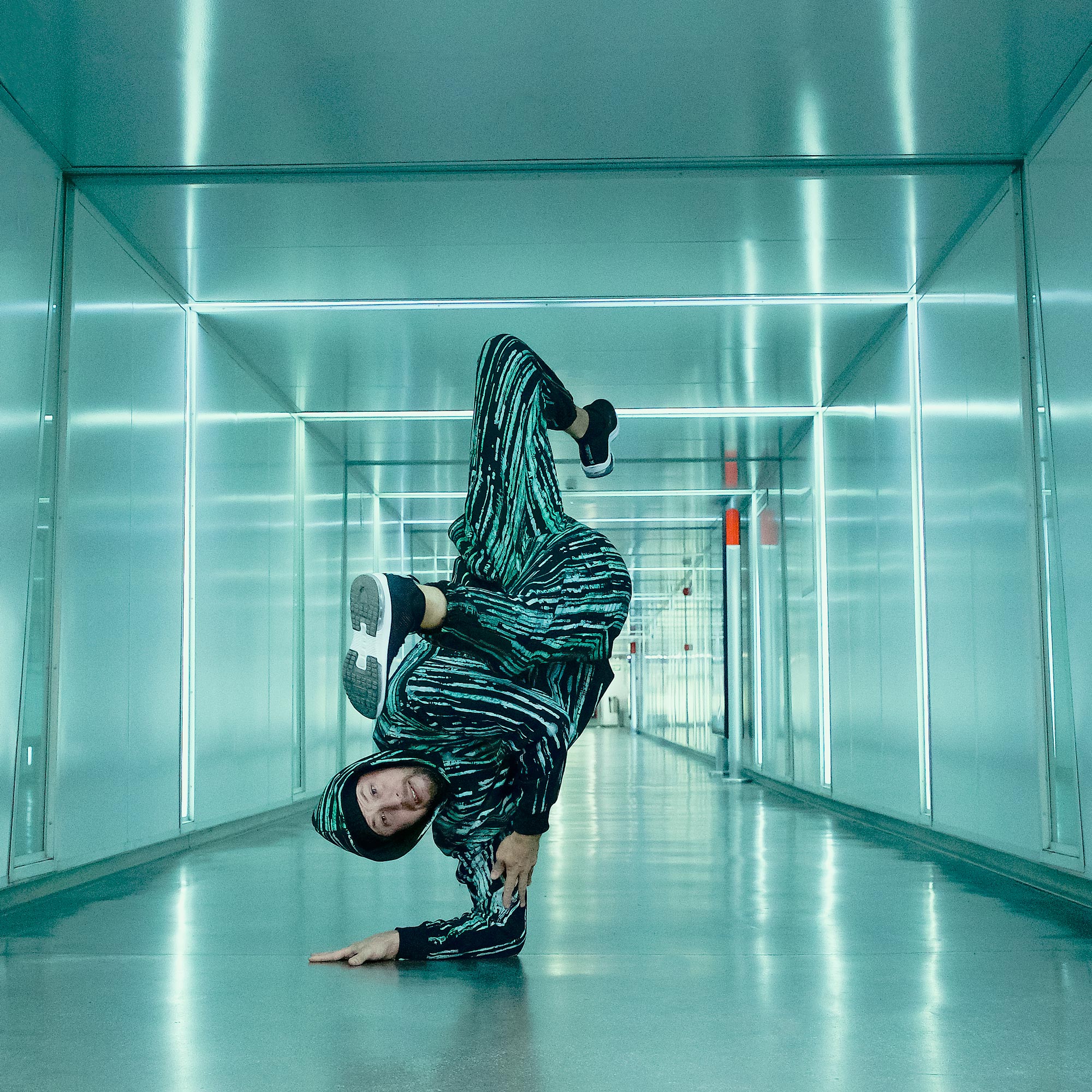 Elbow freeze of break dancing on a matrix tunnel - Jorge Safer