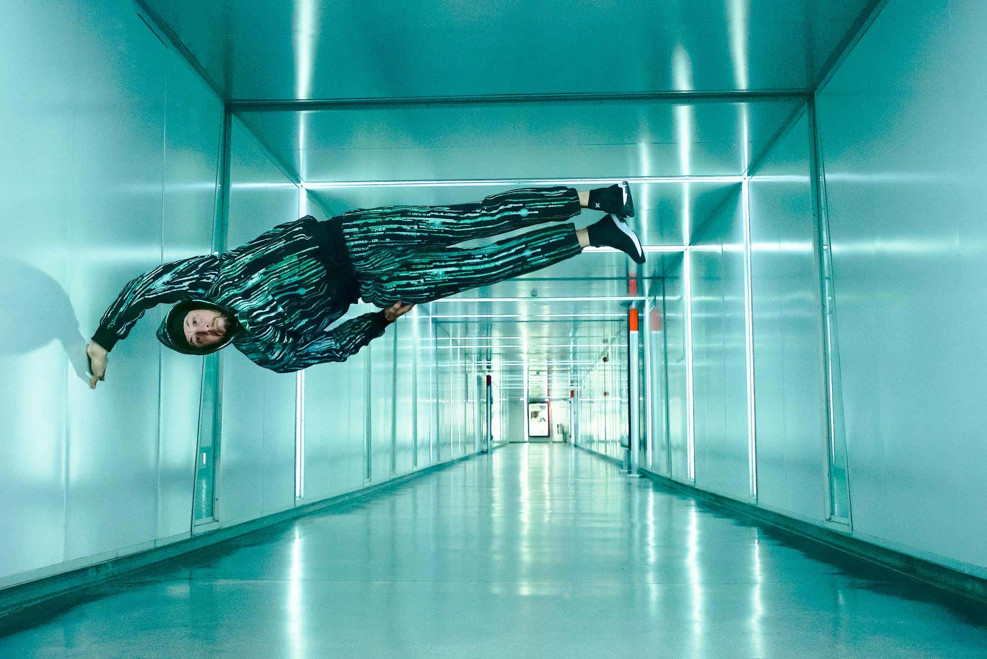 One Hand Stand Horizontal Pose on the Wall